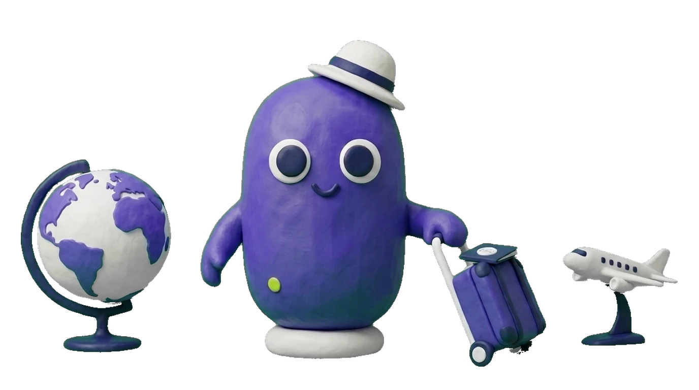 Knety mit Hut und Rollkoffer zwischen Globus und Flugzeugmodell